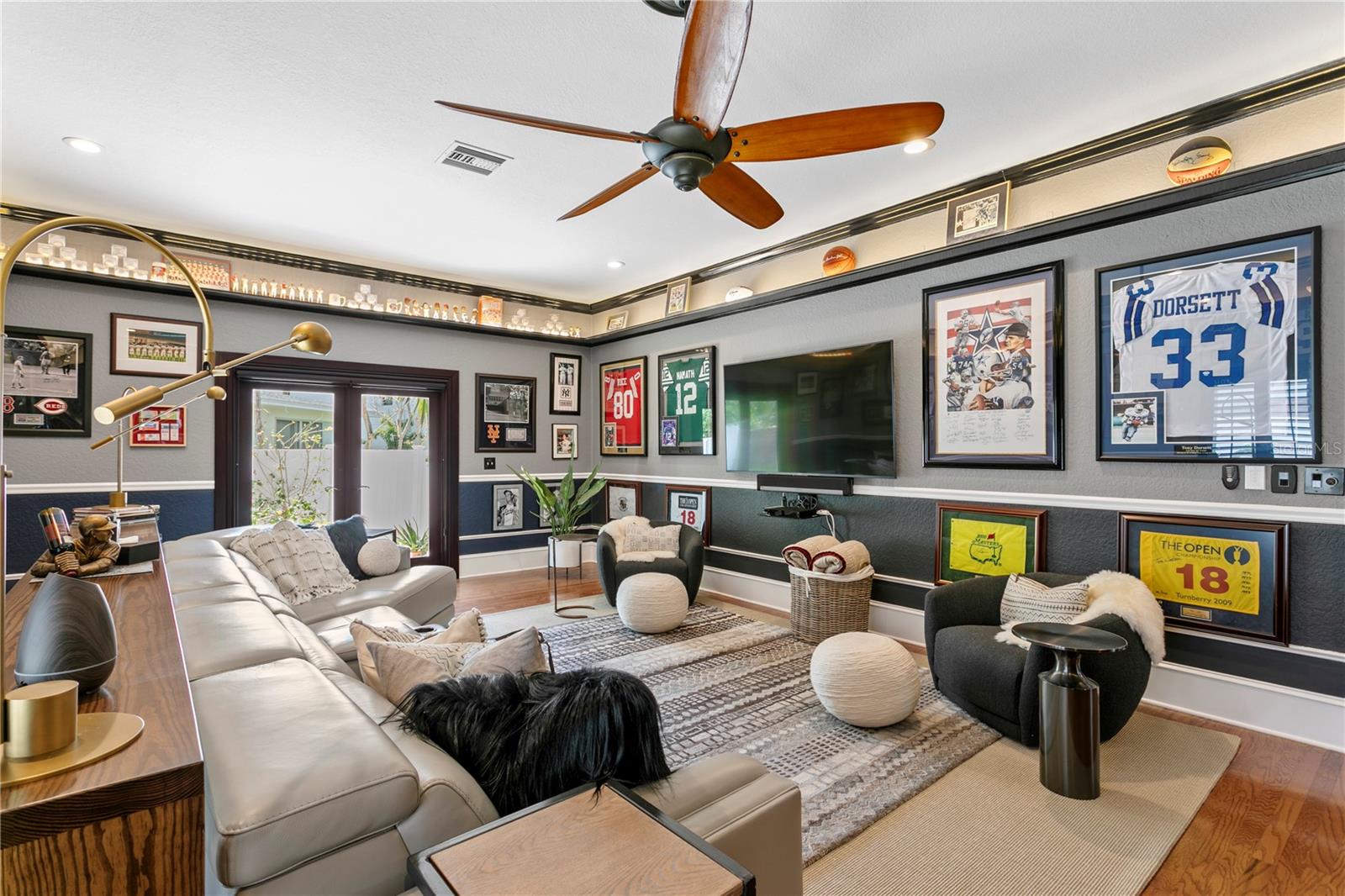The Great Room is located just off of the living room and opens to a porch outdoor area.