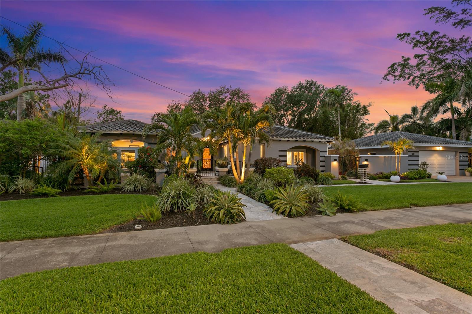 Welcome to this stunning Snell Isle tropical sanctuary.