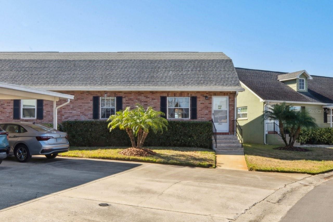 6710 Hickorywood Lane is a two bedroom and two bath condo in The Wilds community