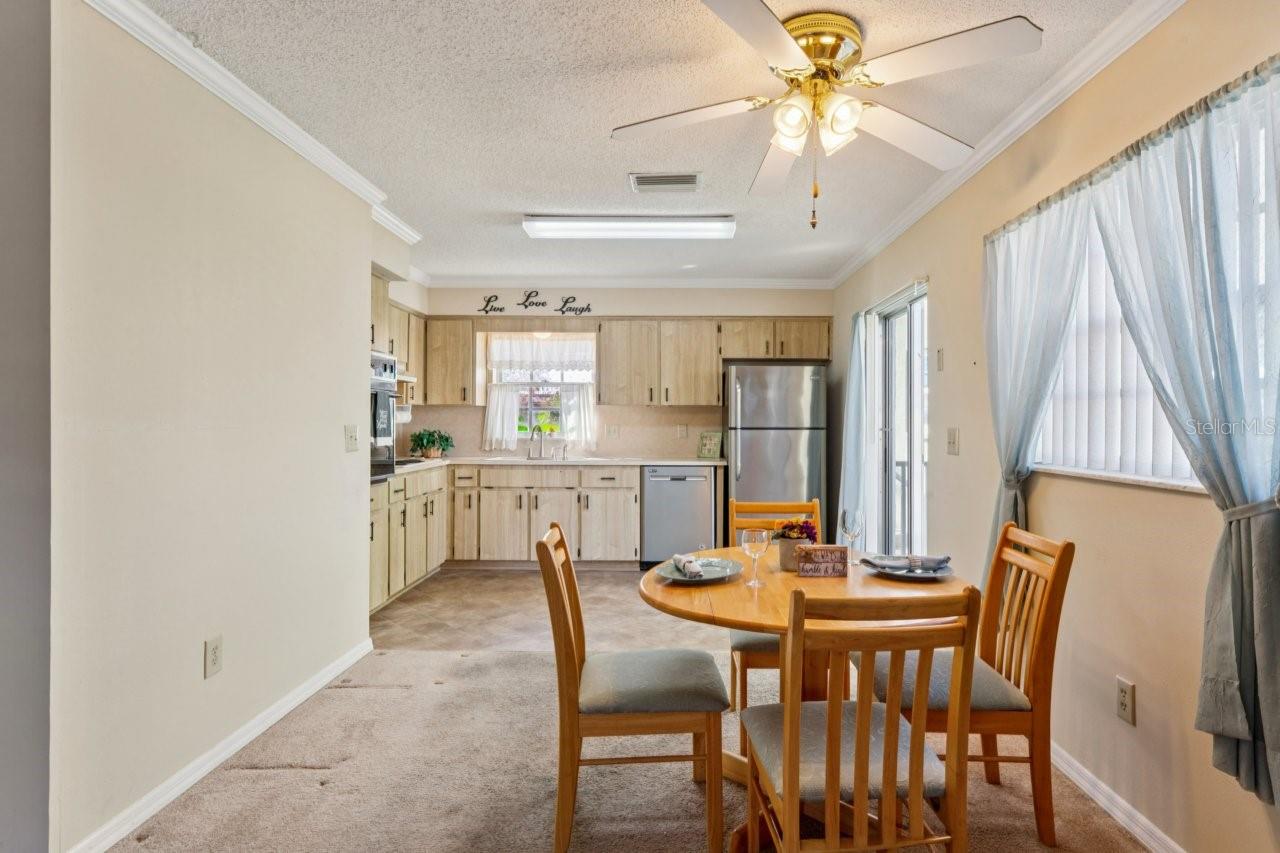 View of the dinette and kitchen.