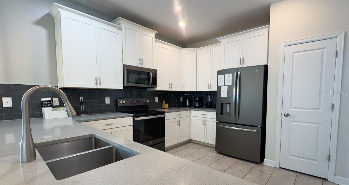 8912 CABOT CLIFFS DR, DAVENPORT, FL, 33896