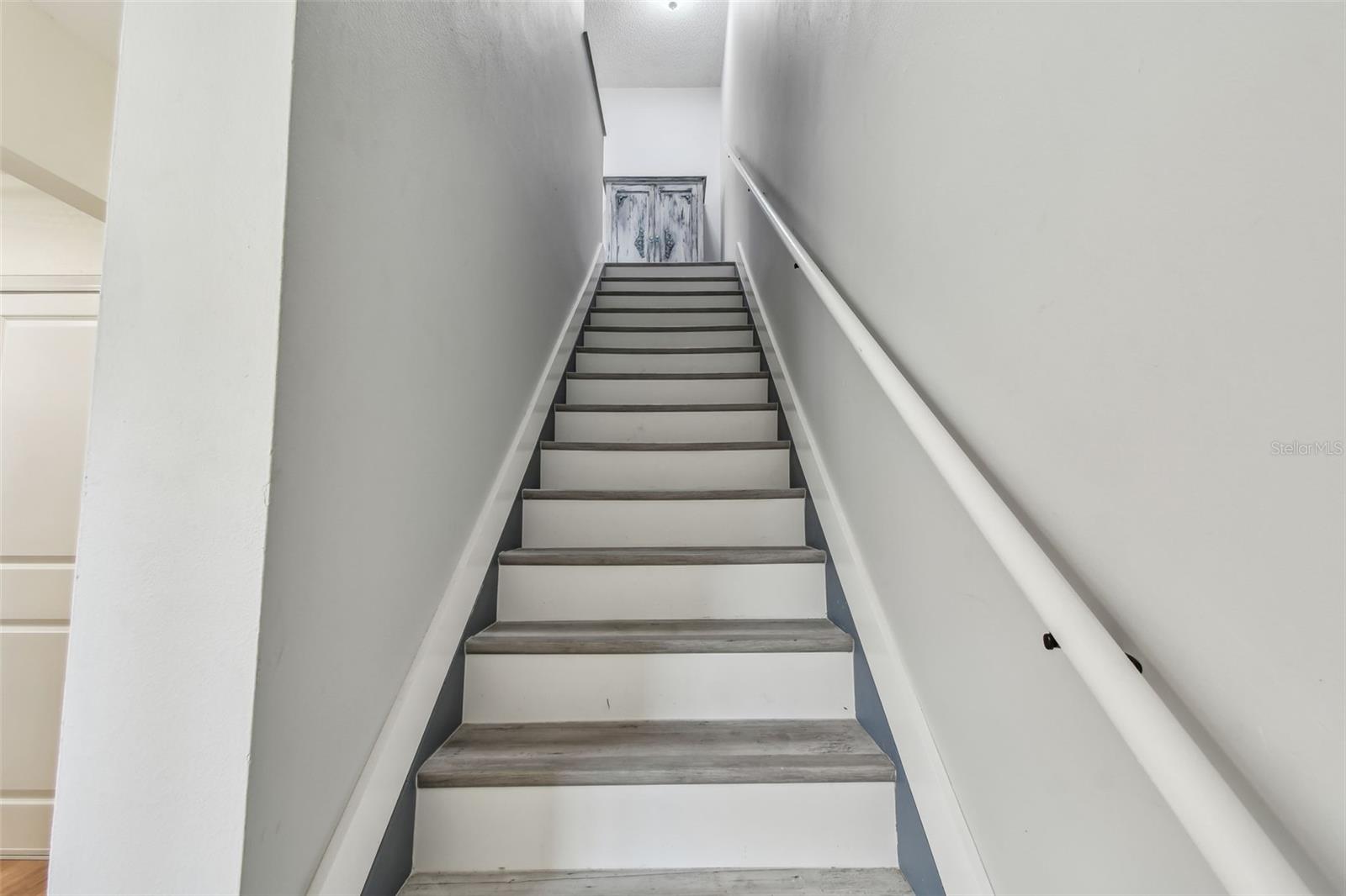 Head upstairs to three bedrooms/flex space.