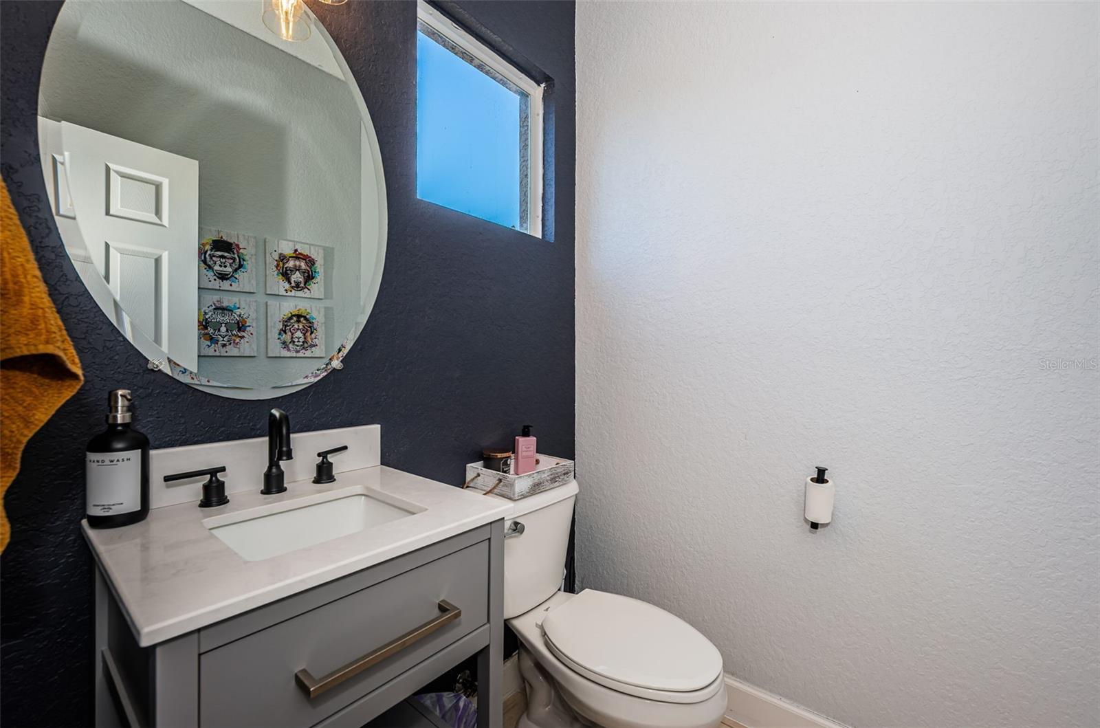 half bathroom off of the living room