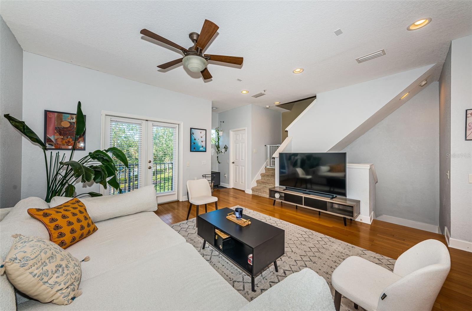Open concept living room, dining room and kitchen.