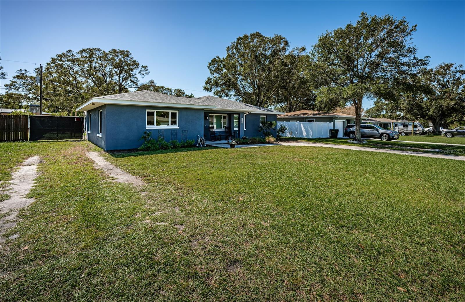 side gate with room to park a boat or RV