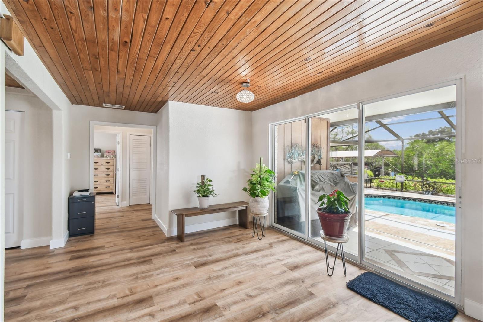 Sliding doors leading out to pool from main living area