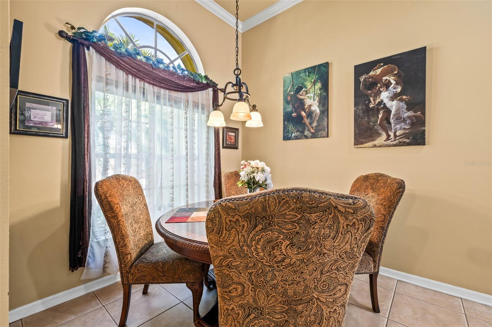 Cheerful dining room with lovely view of front yard