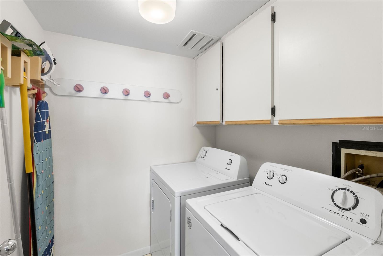 Laundry/ Utility Room with Storage Cabinets