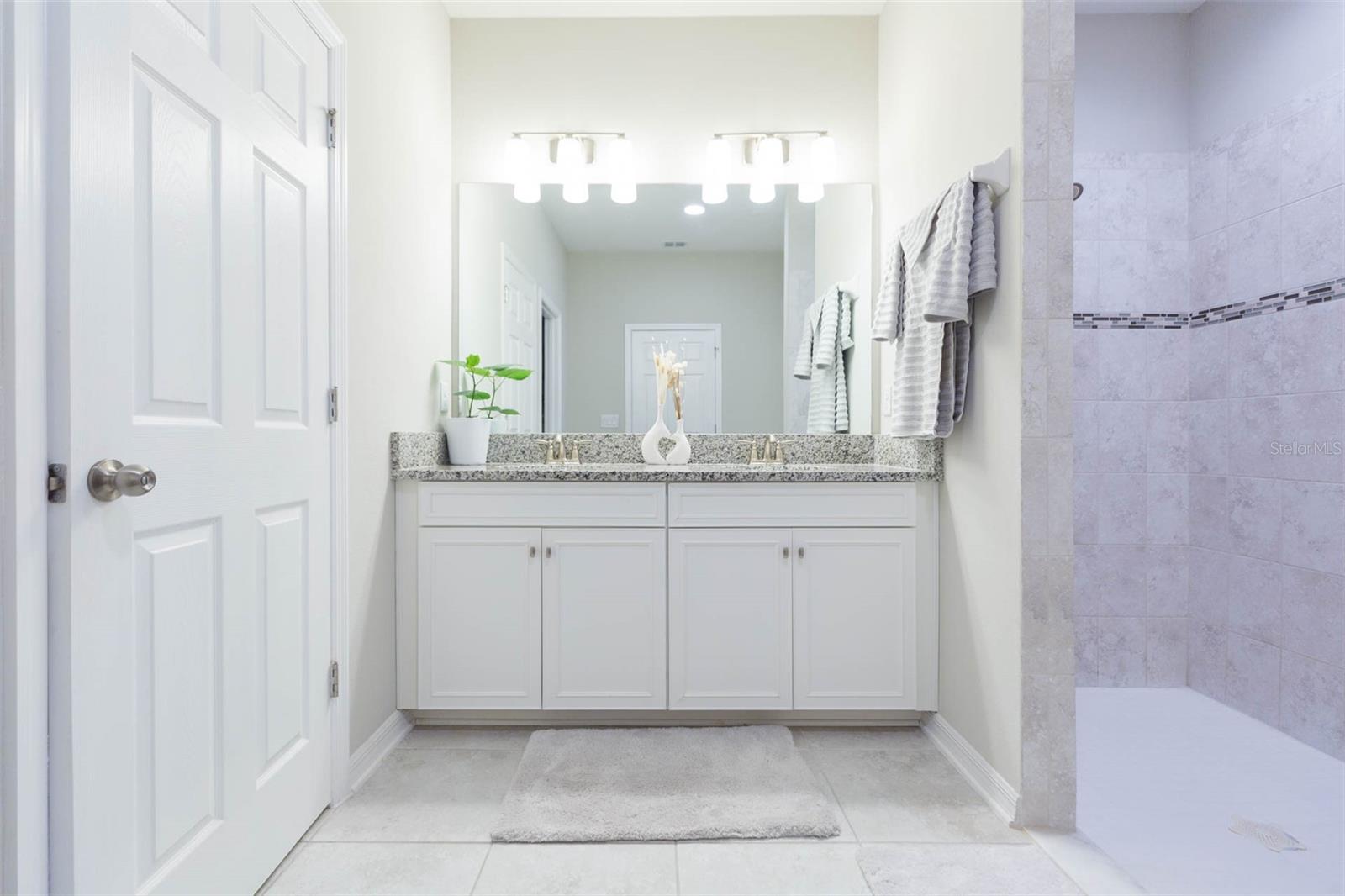 Master Dual vanities and tiled Shower