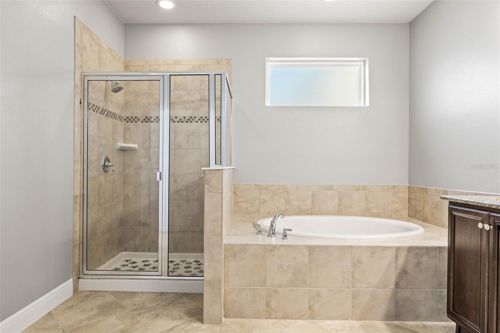 Primary Bathroom with Tub & Shower