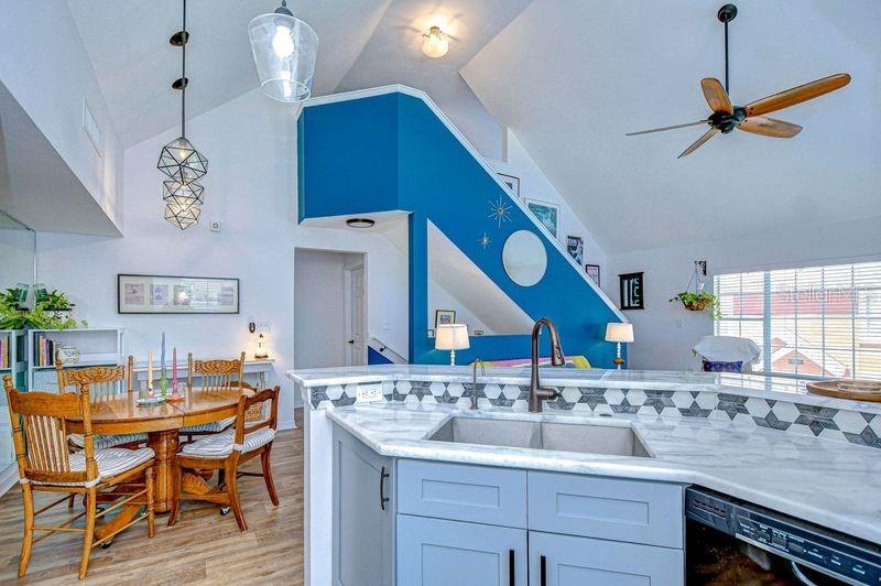 View from Kitchen toward stairs to loft