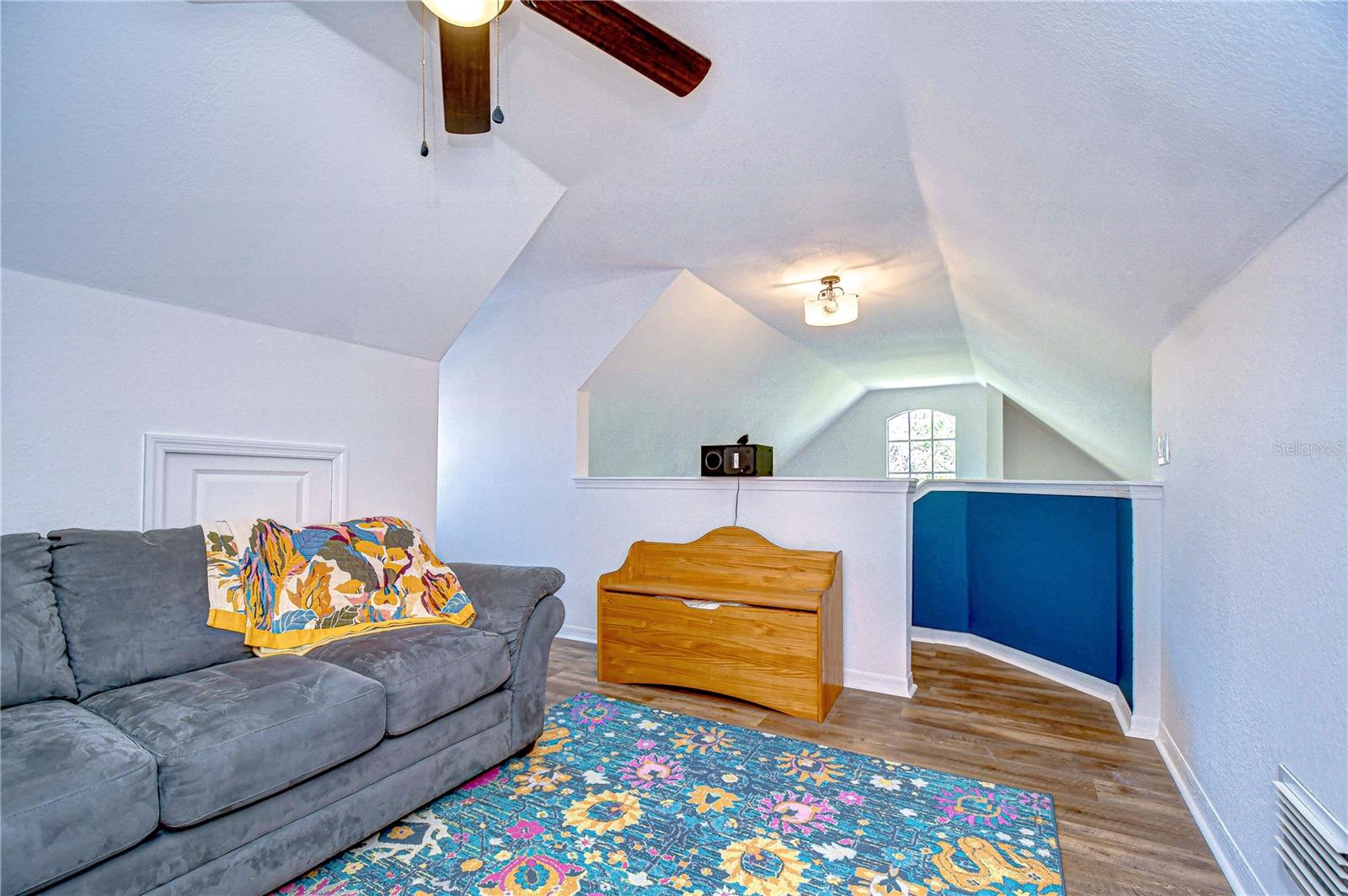 View from bookshelf back toward stairs