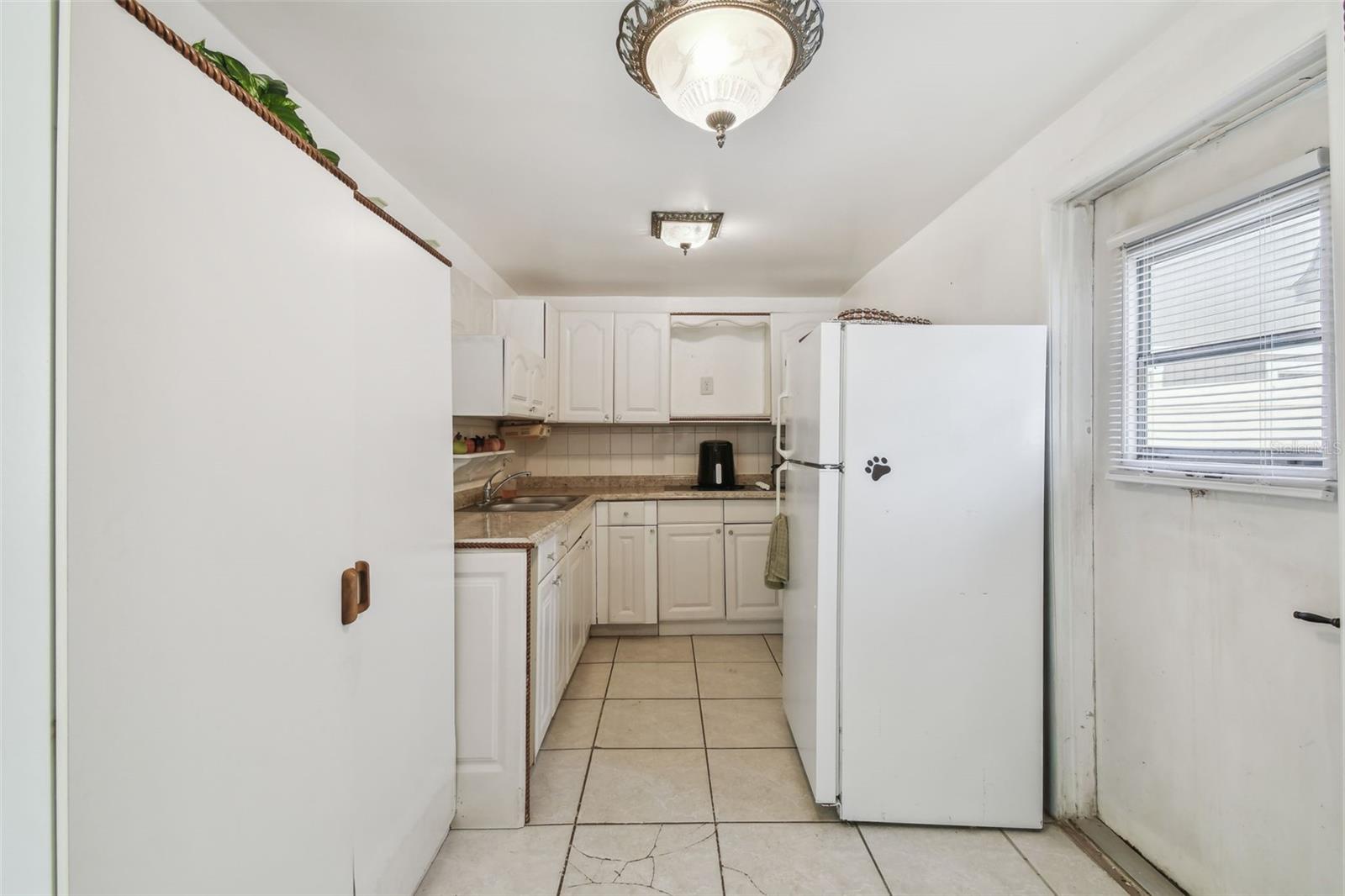 6914 N OLA AVE, TAMPA, FL, 33604