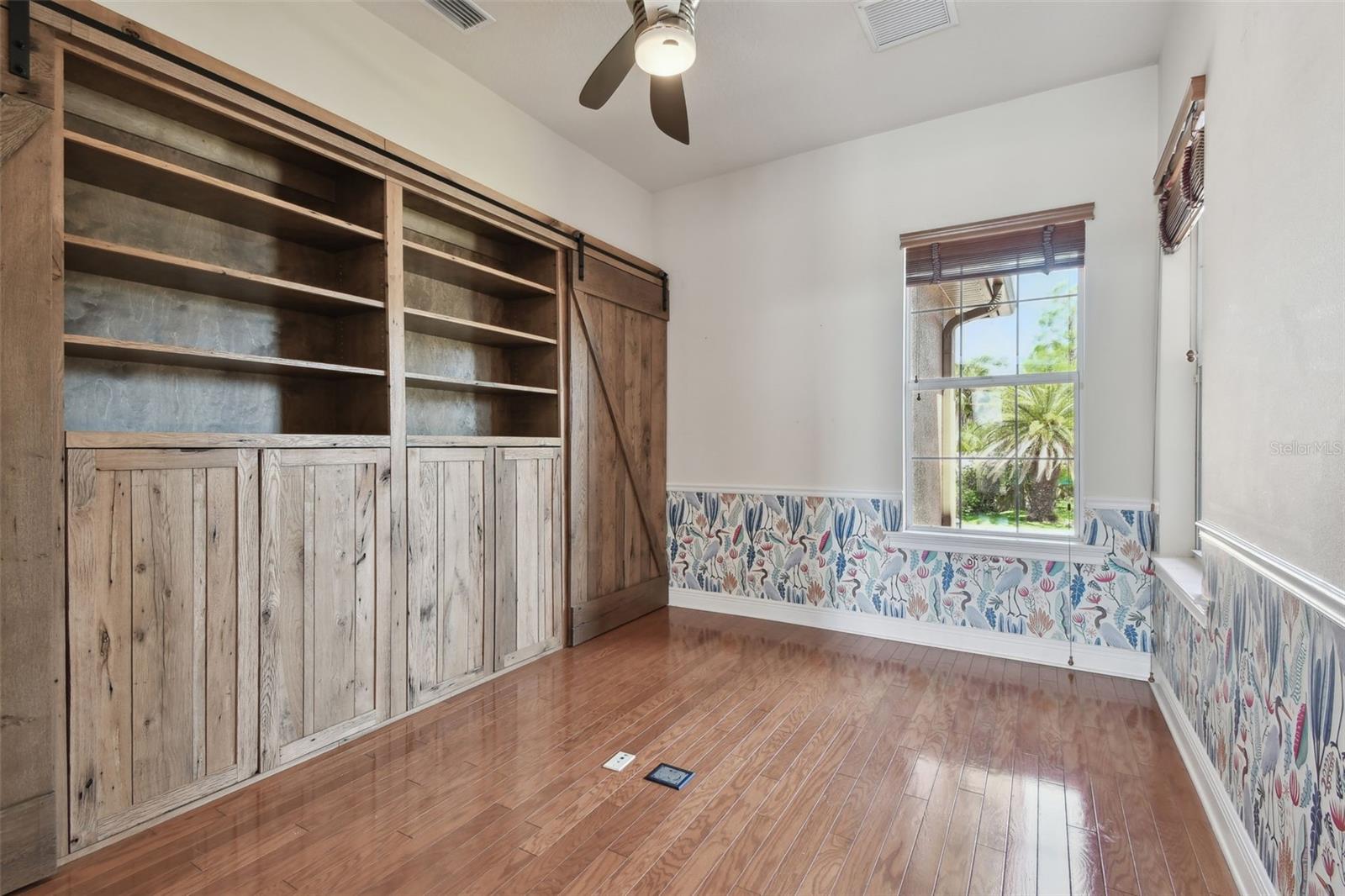 Staged office overlooking the front yard.