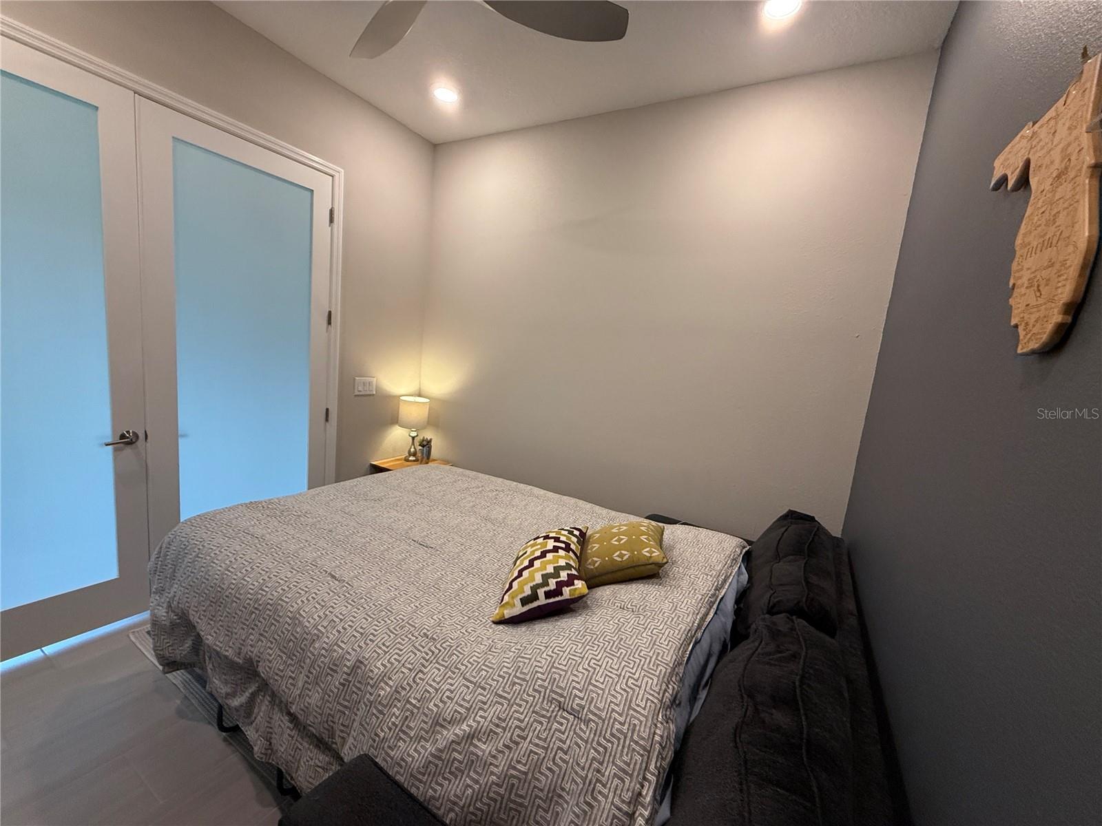 Den, when in use as a bedroom