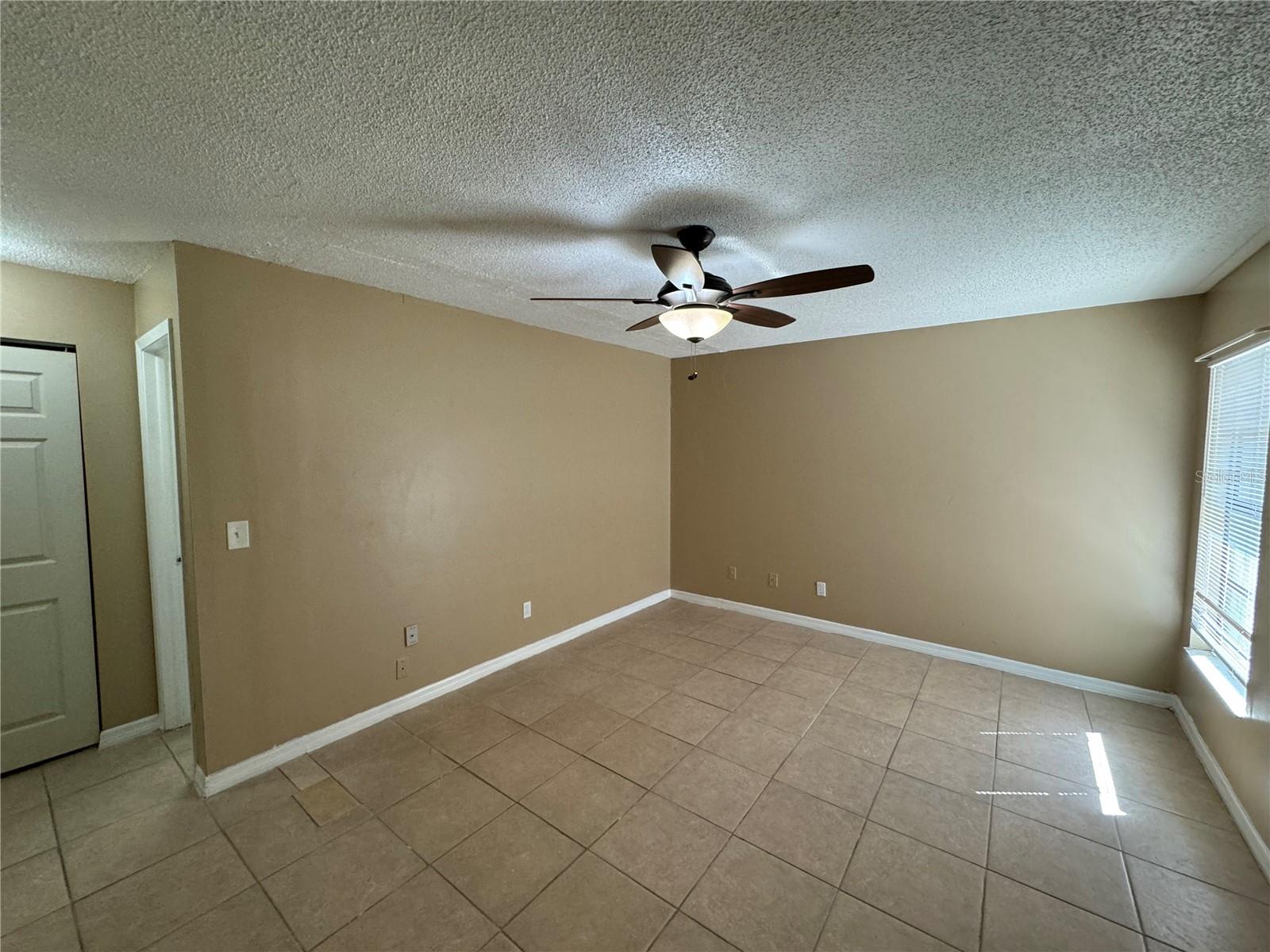 10427 FLOWERS AVE, ORLANDO, FL, 32825