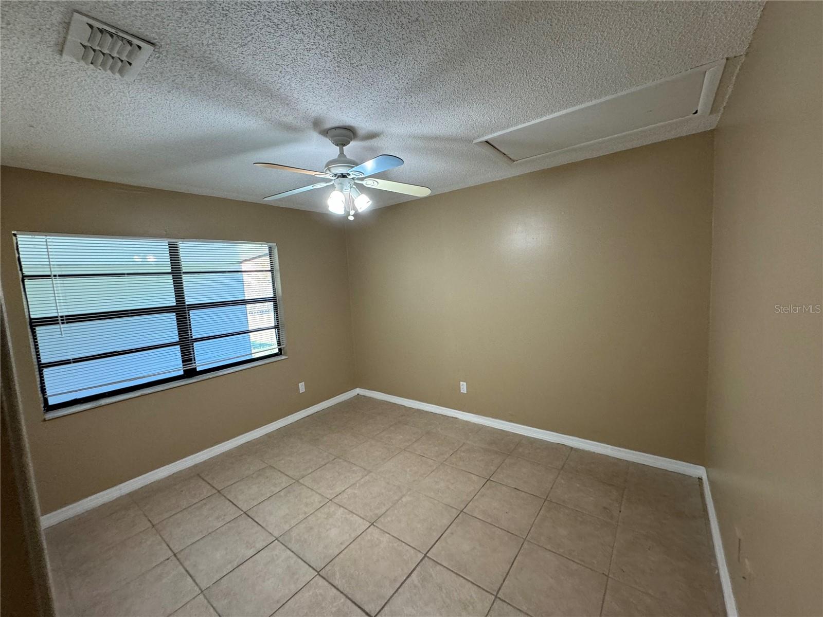 10427 FLOWERS AVE, ORLANDO, FL, 32825