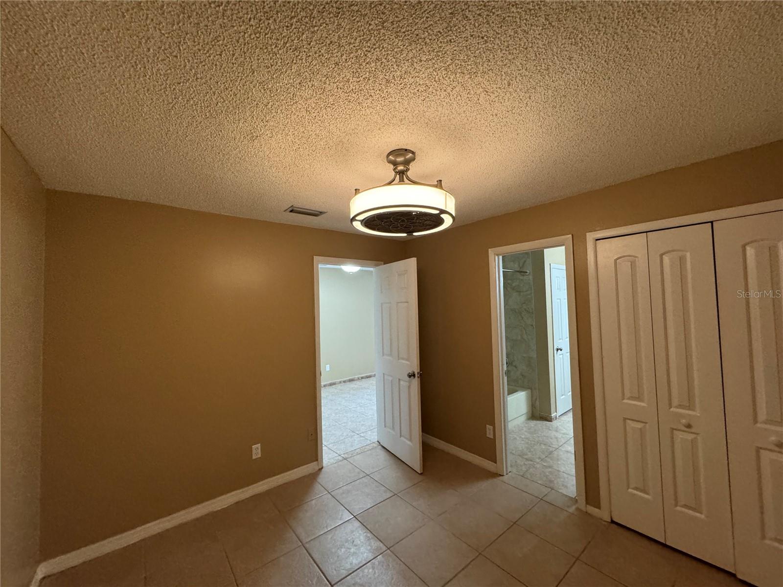 10427 FLOWERS AVE, ORLANDO, FL, 32825