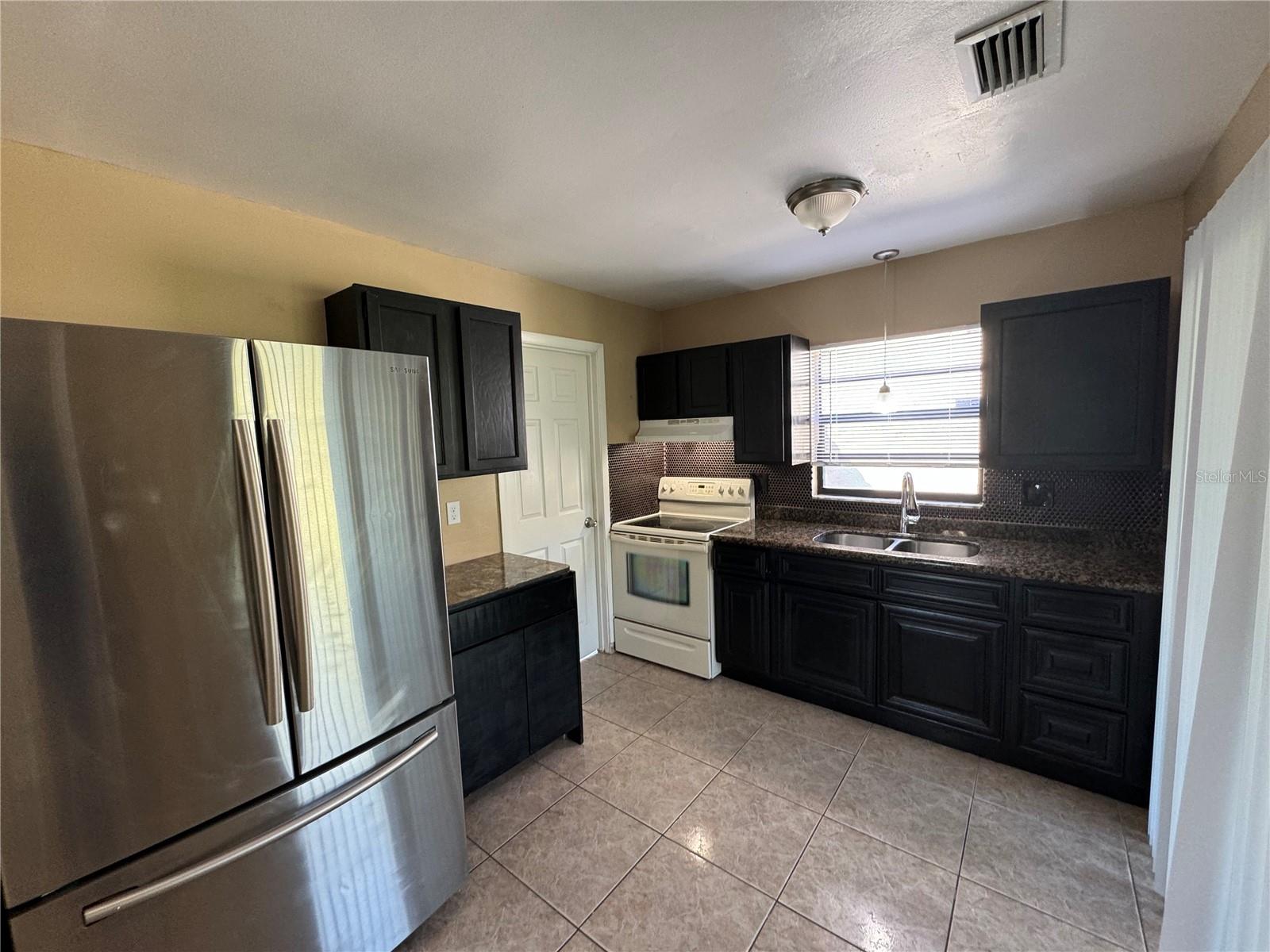10427 FLOWERS AVE, ORLANDO, FL, 32825