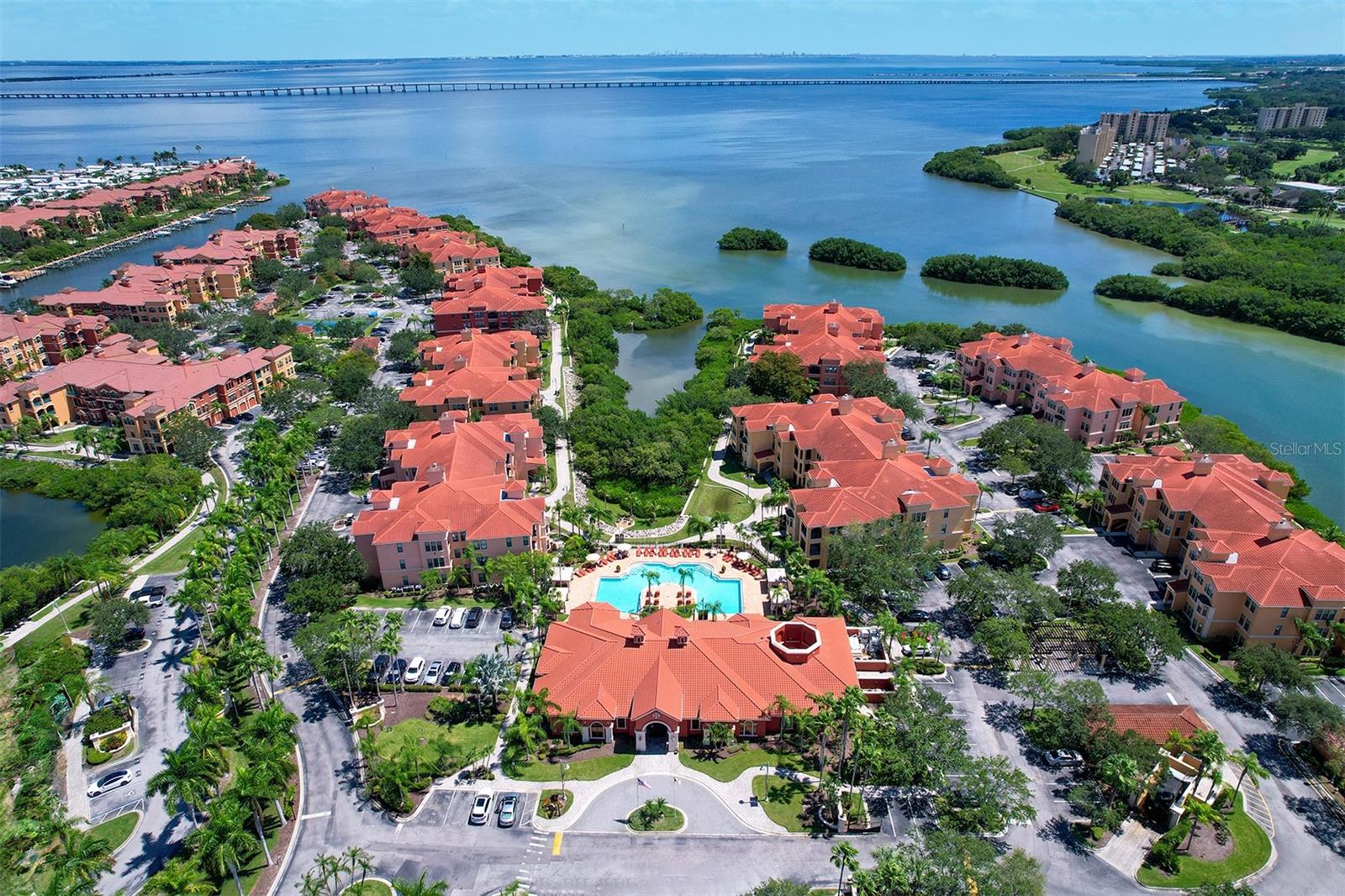aerial view of the clubhouse and community looking east into Old Tampa Bay