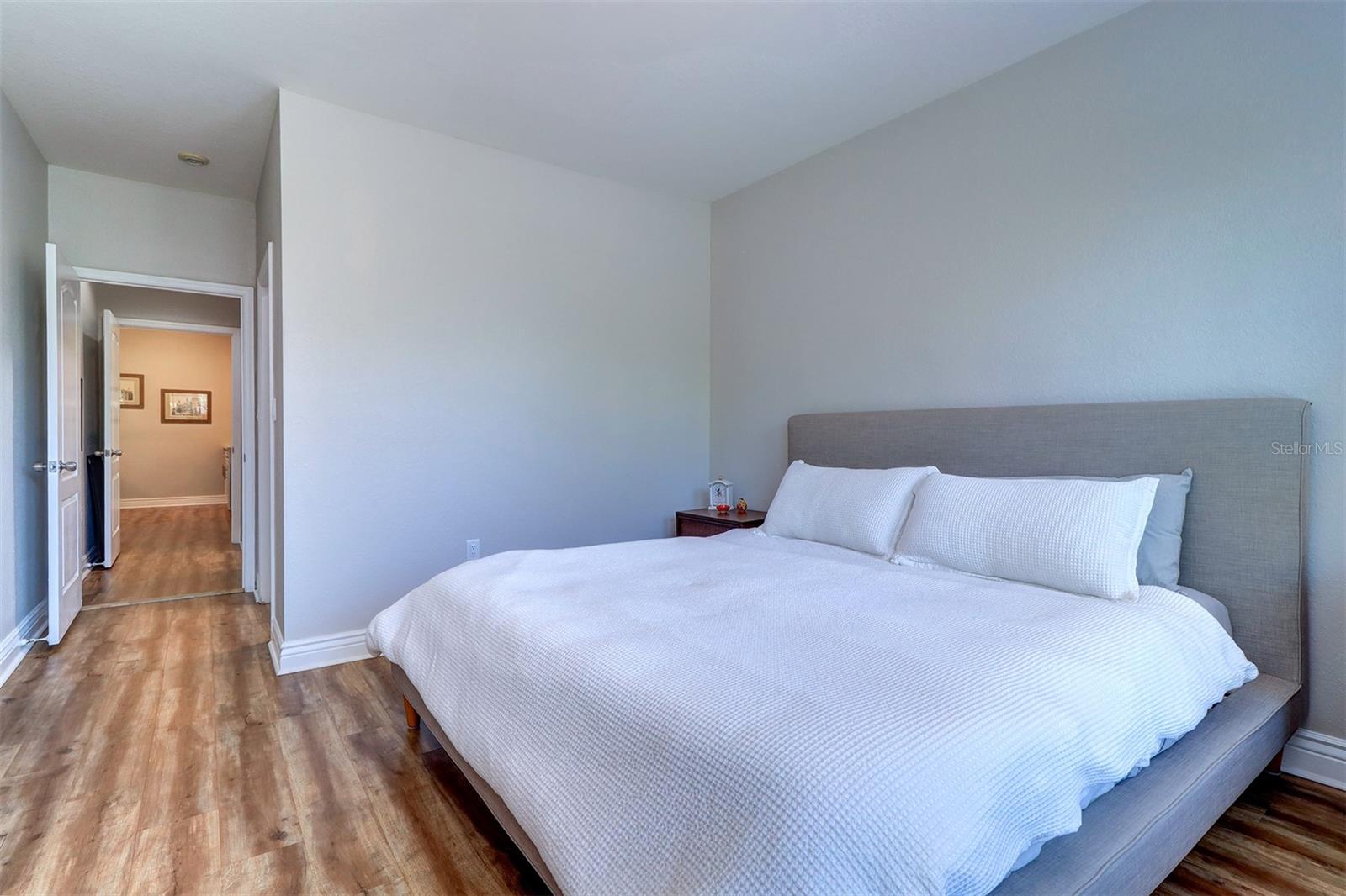 Primary bedroom to walk in closet and bath area