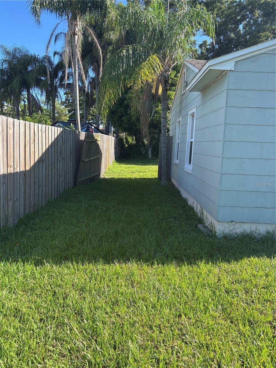 side gate entrance to back yard for camper, motor home, boat etc.