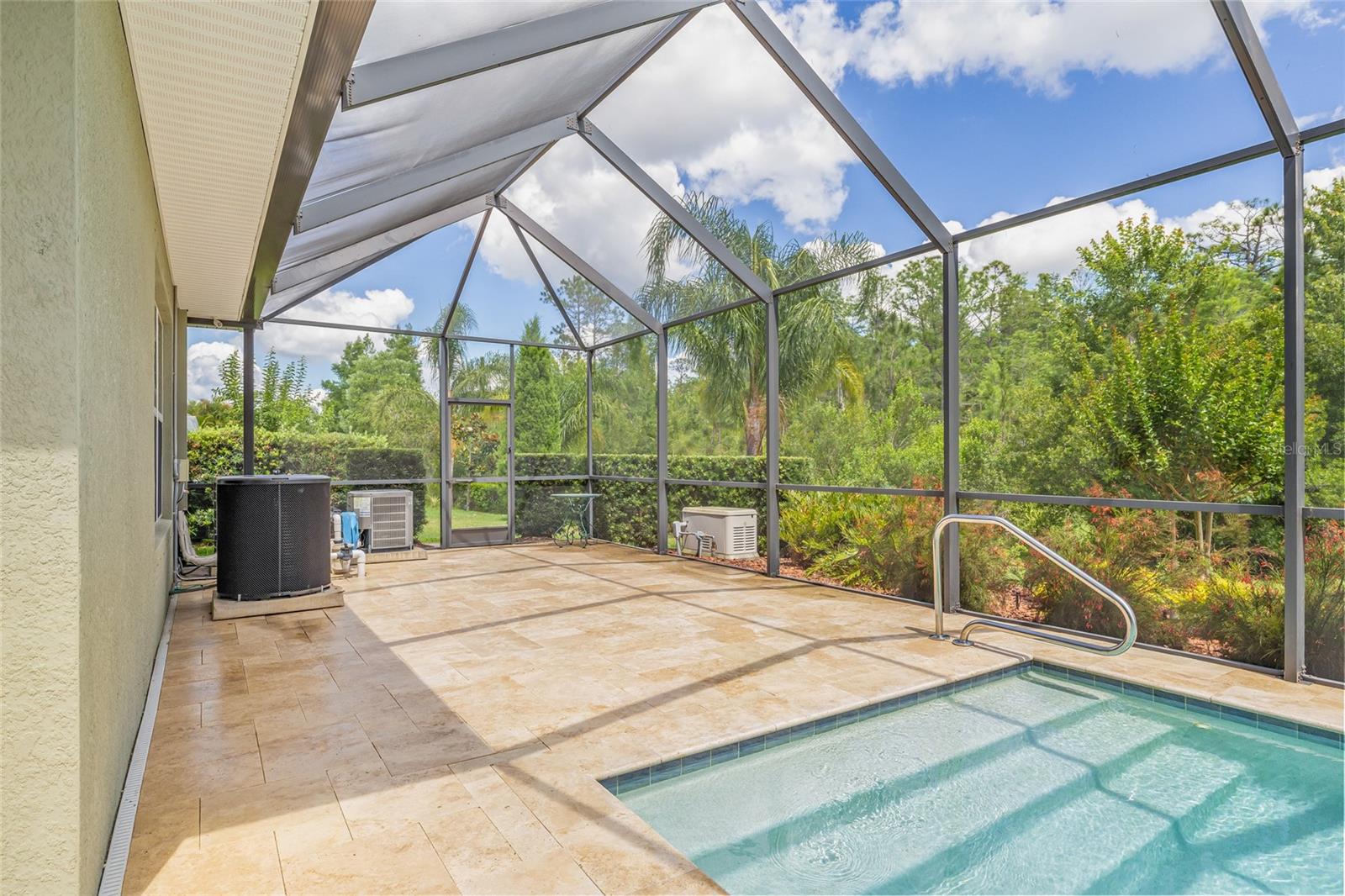 Screened Pool area with travertine