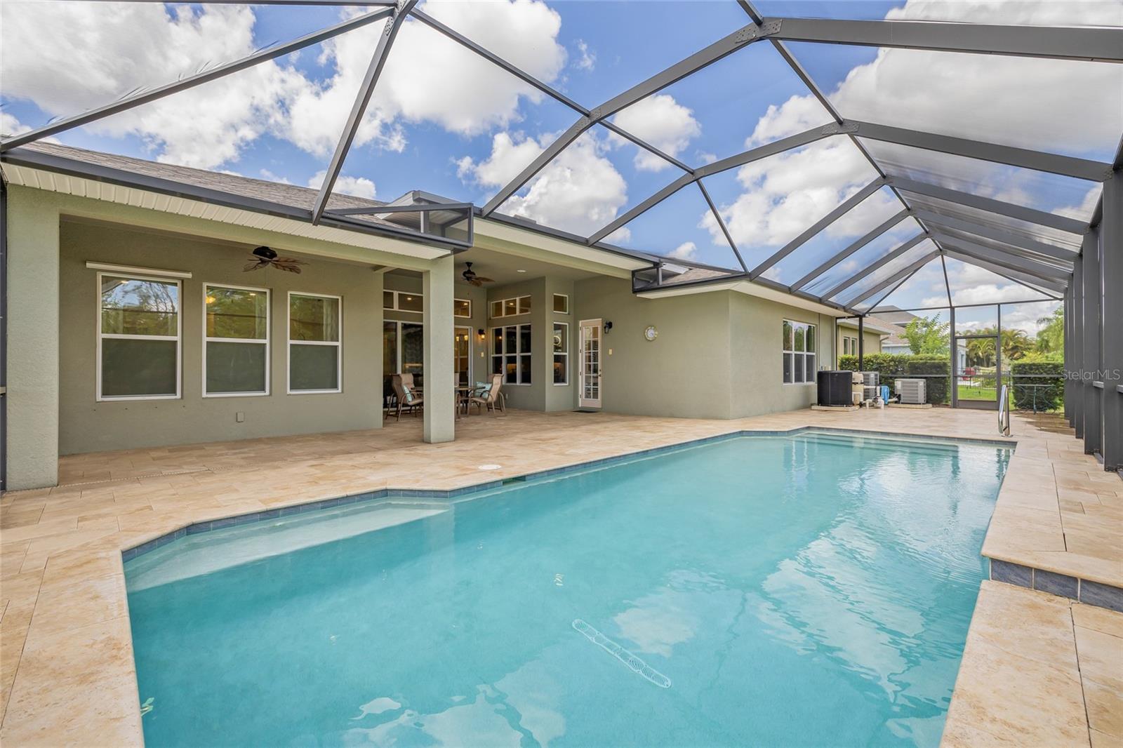 Screened Pool area with travertine