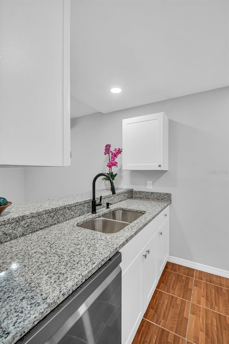 Kitchen with New Dishwasher and Sink
