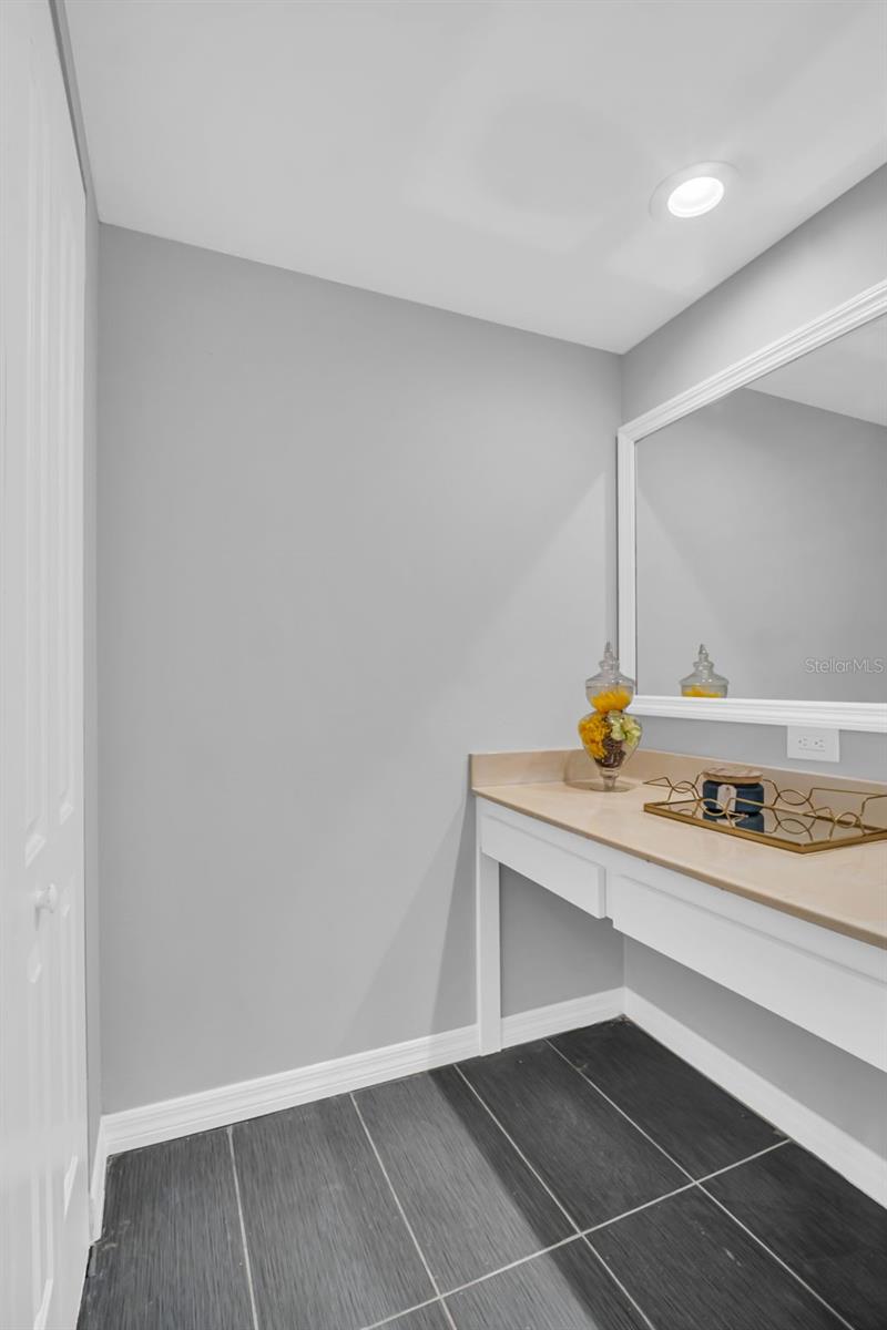 Primary Bathroom Vanity and Linen Closet