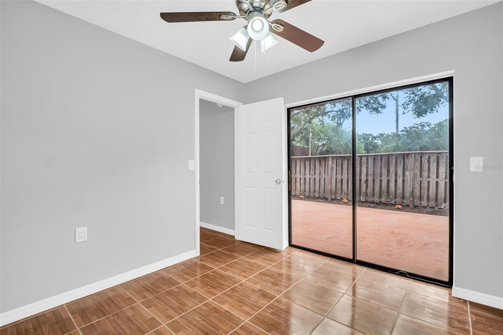 Downstairs Bedroom/Office and Sliding Glass Door to Lanai