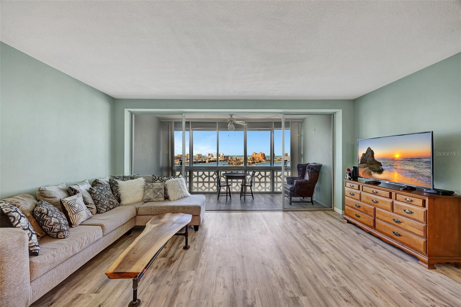 Enjoy the view from your open concept Great Room and enclosed Sunroom