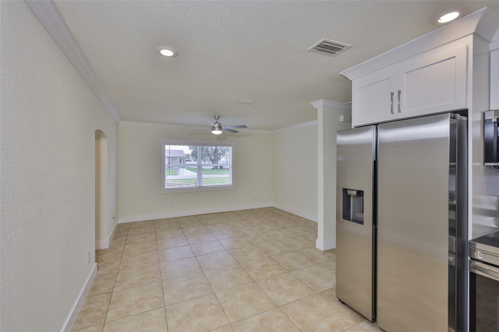 Living area with beautiful crown molding
