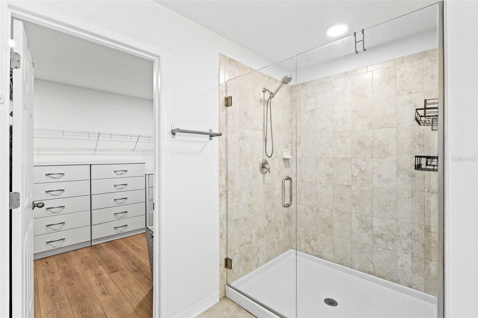 Upgraded Primary Oversized and Frameless Shower