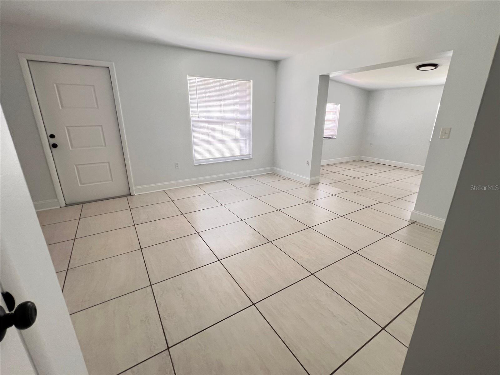 hallway looking to living room and bonus room