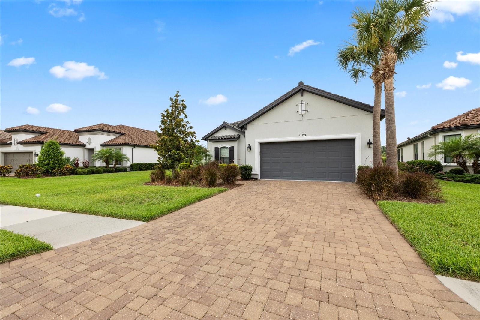 Paver driveway into 2 car with tandem garage