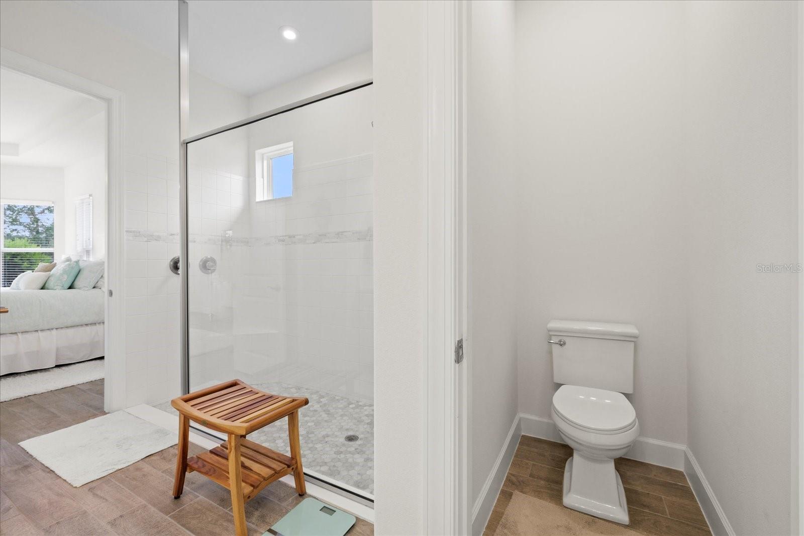 Private toilet closet in primary bathroom