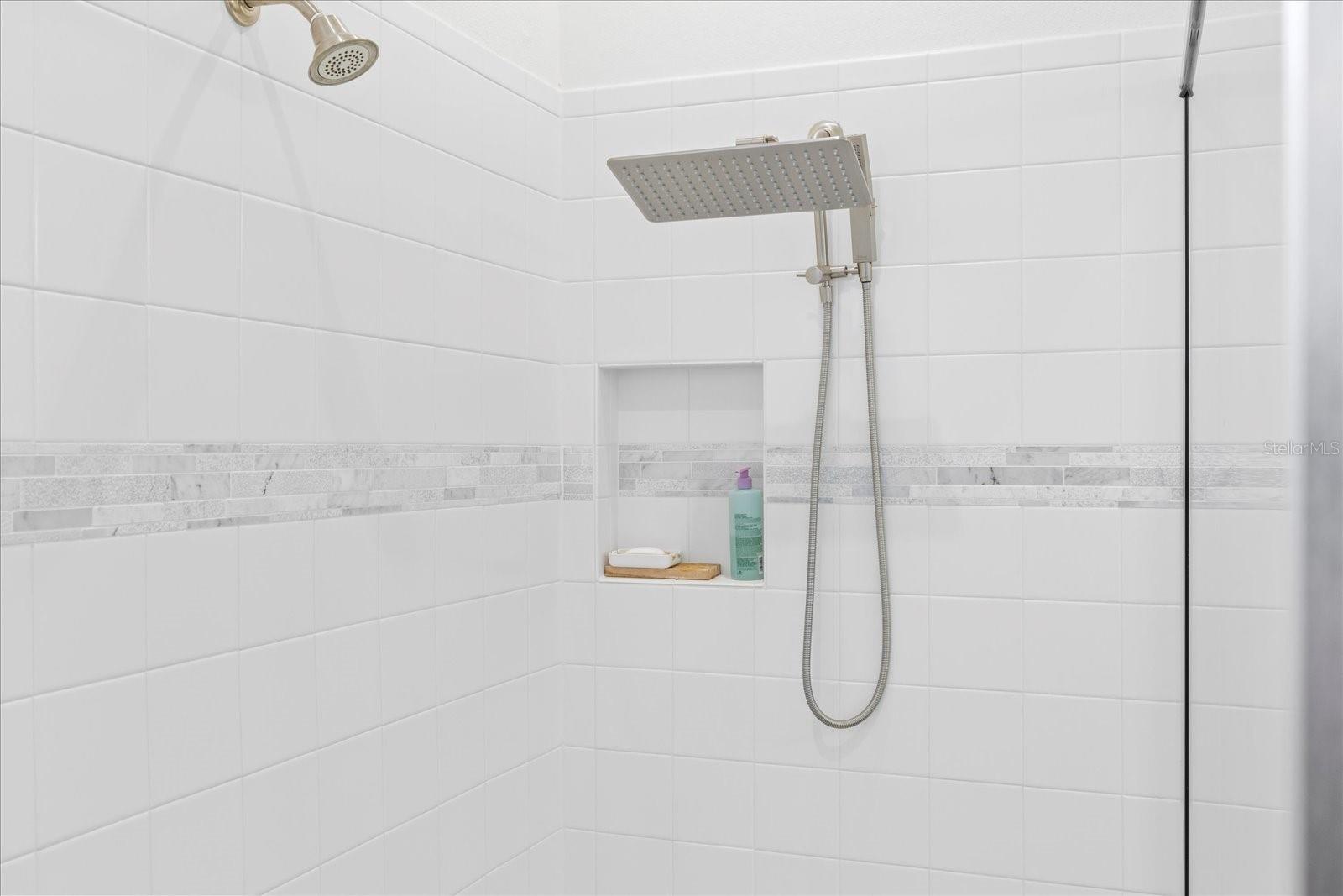 Dual option shower heads with hand held nozzle