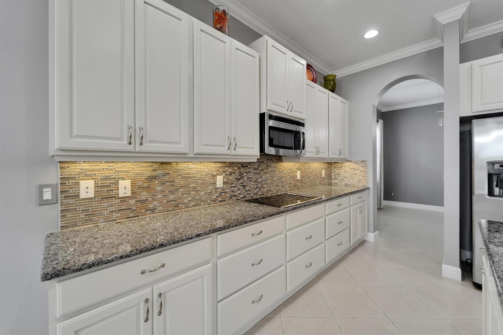 Custom back splash with underneath lighting