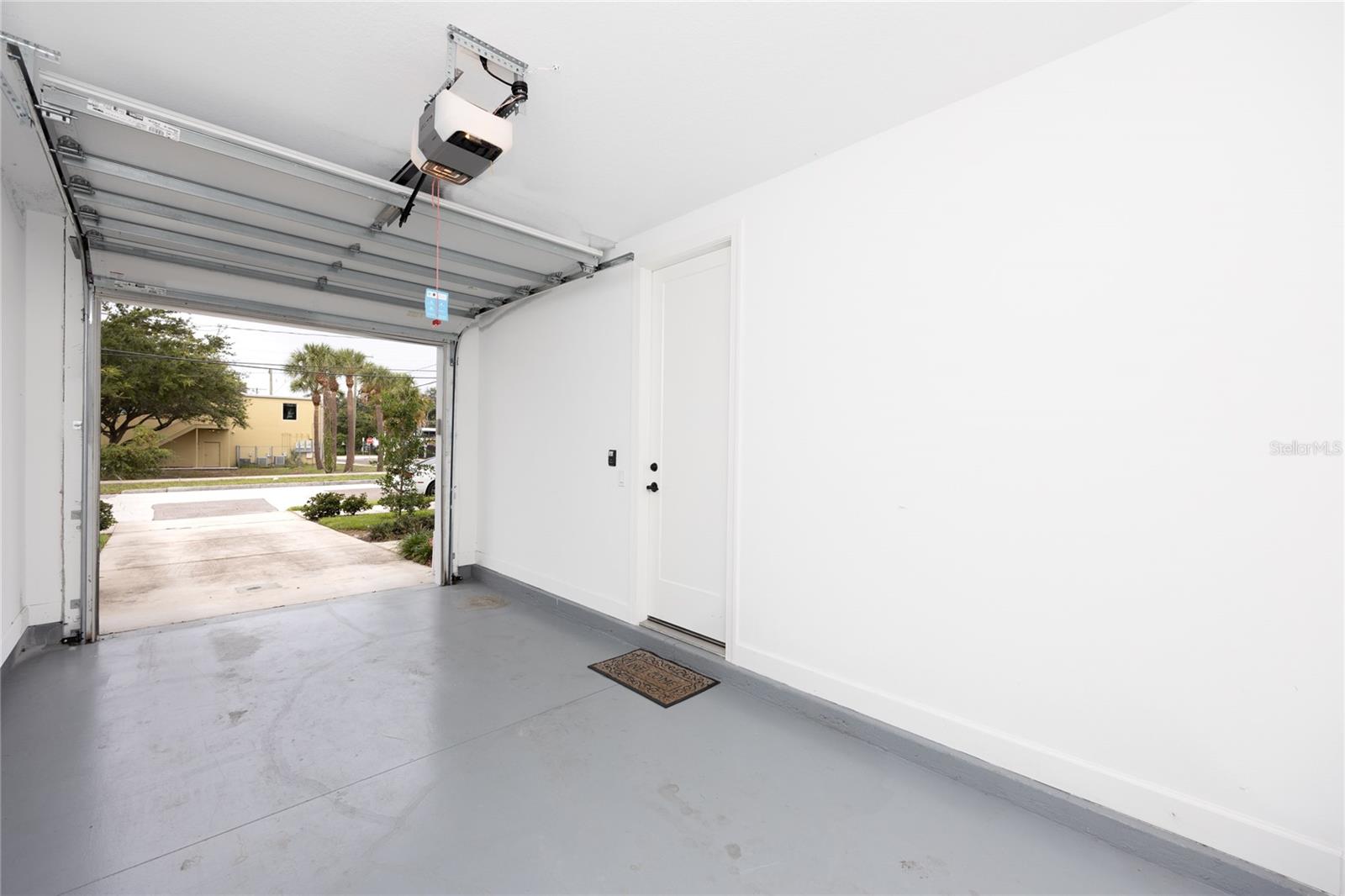 One car garage with epoxy flooring.