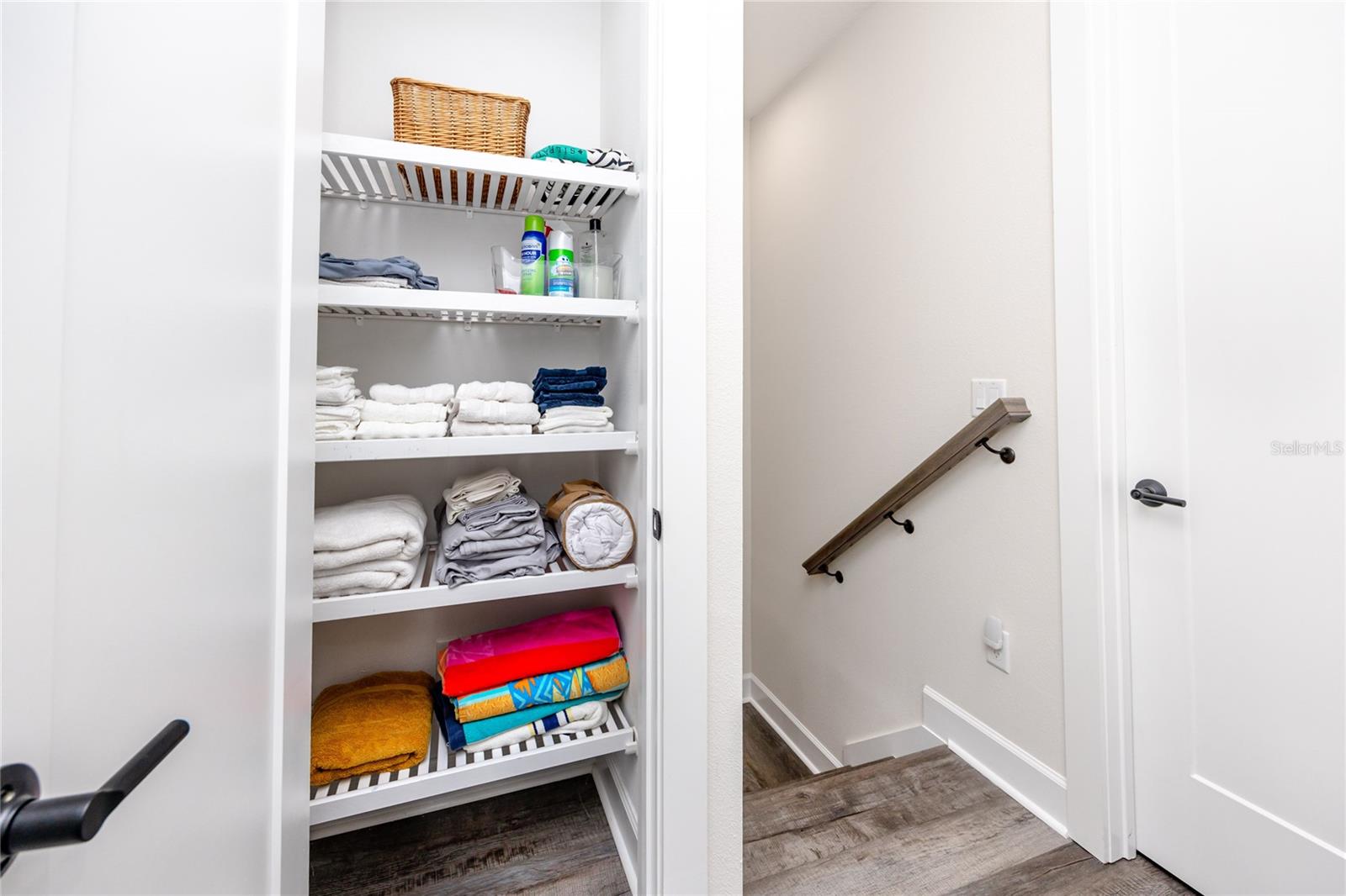 Hall closet between two bedrooms