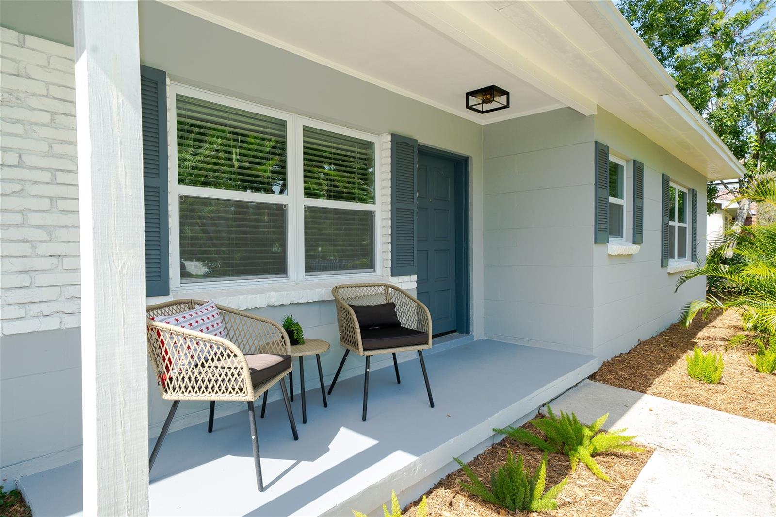 Covered and inviting front porch