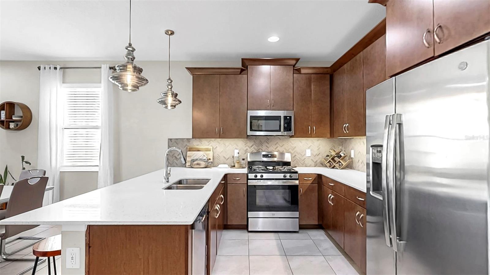 Kitchen Features Natural Gas Stove, Stainless Steel Appliances, Tons of Storage