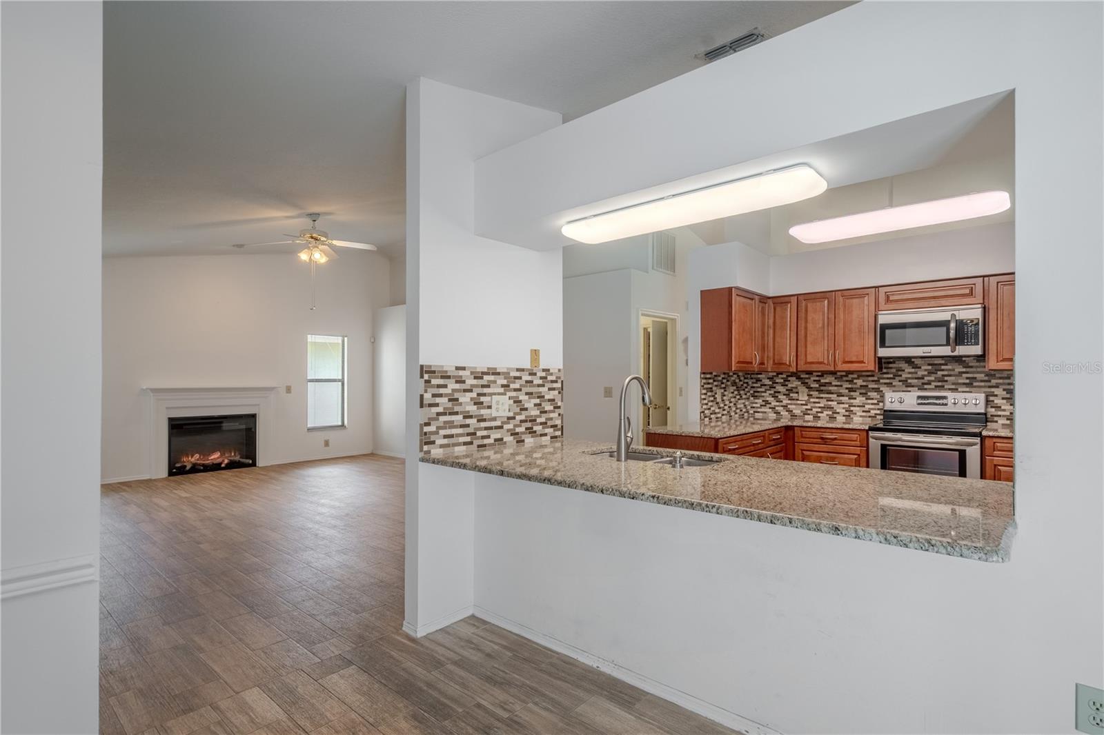 The kitchen pass thru and breakfast bar