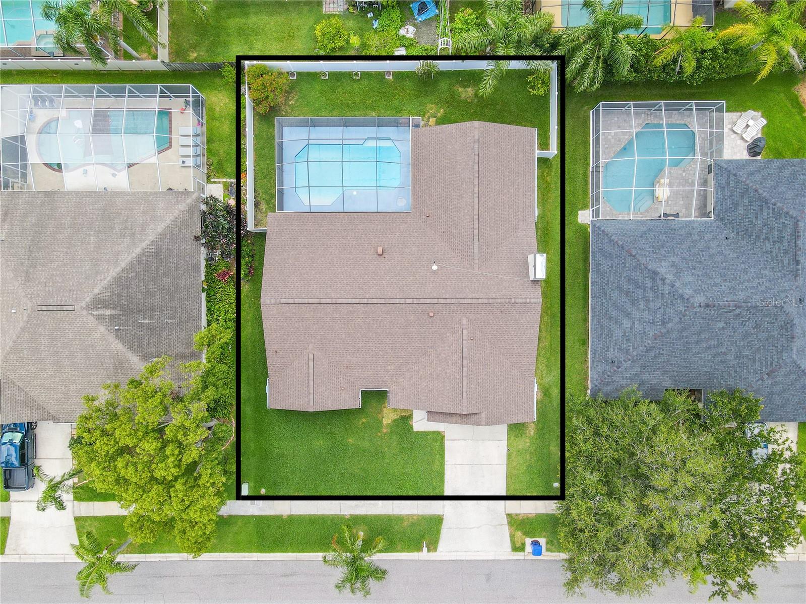 Clean lines, a new roof (2022),  and thoughtful landscaping give this home a fresh, timeless look—one that hints at the care and pride of ownership found inside.