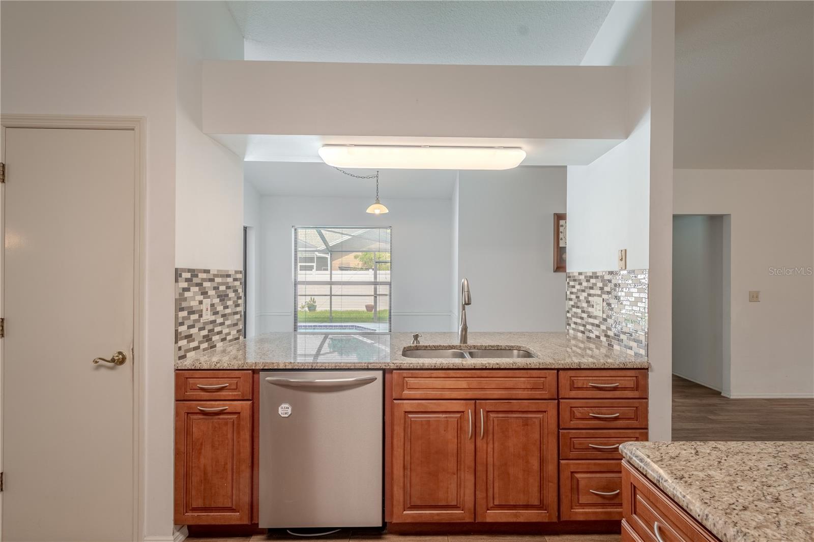 The kitchen opens to the family room