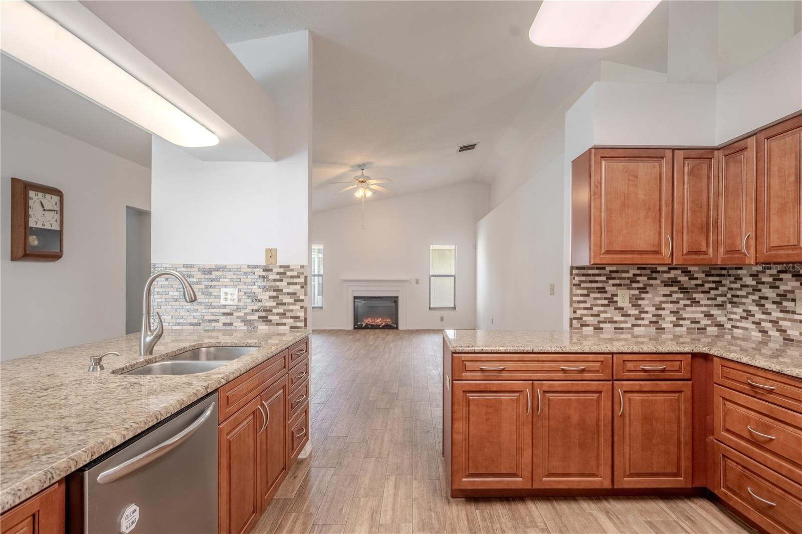 The kitchen opens to the family room.