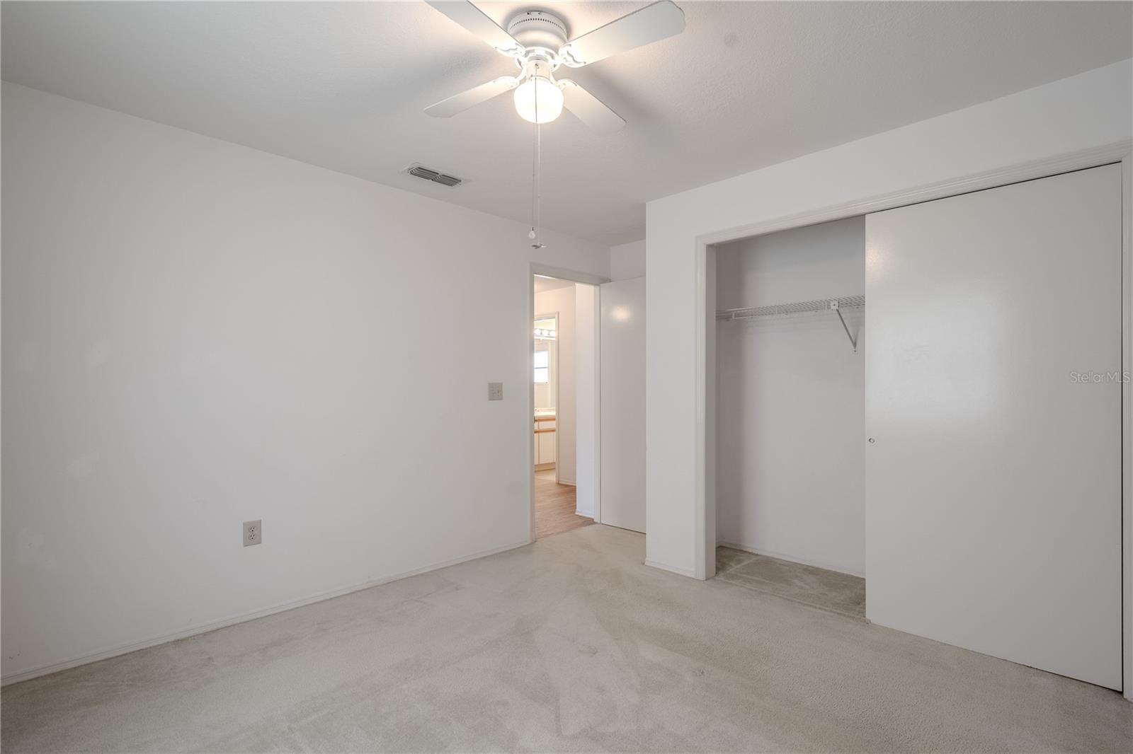 3rd bedroom: A generous closet with sliding doors provides functional storage, making this room well-suited for guests, a growing child, or a home office setup.