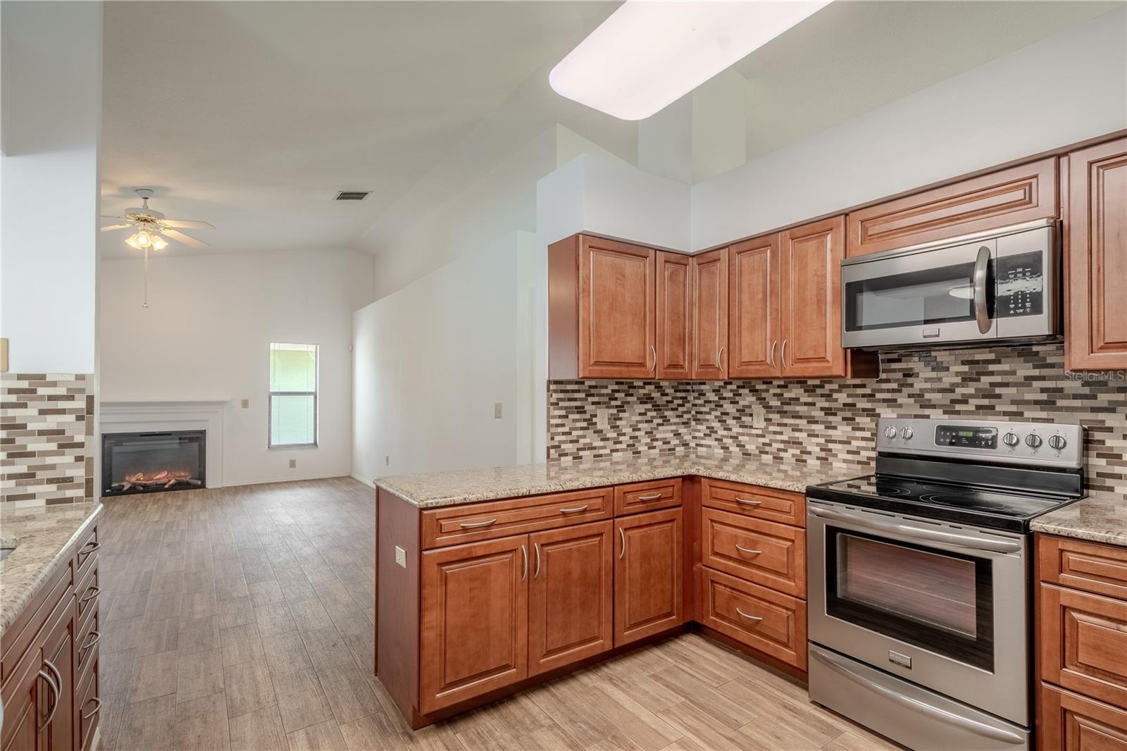 The kitchen opens to the family room