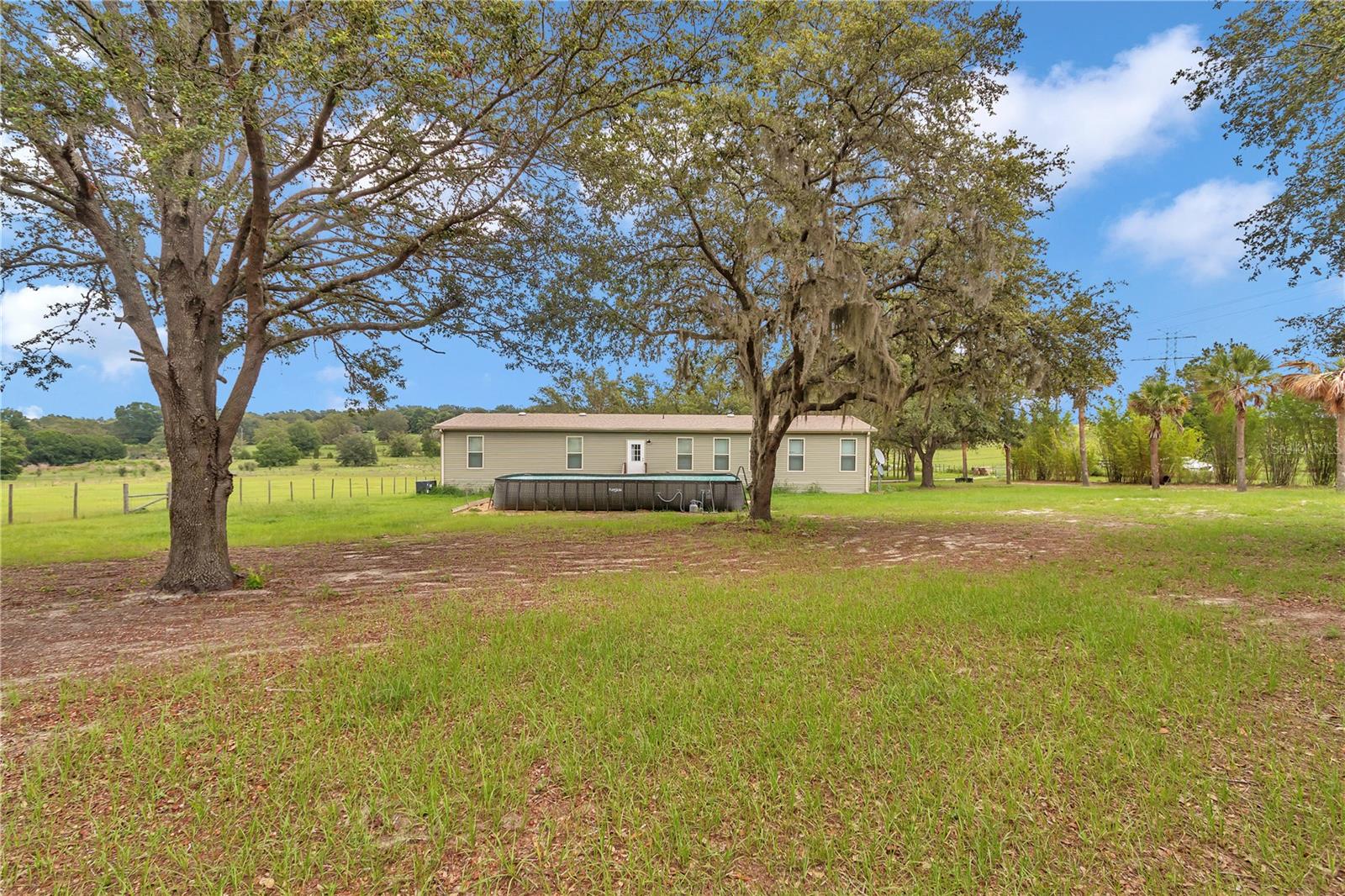 7565 DEWEY ROBBINS RD, HOWEY IN THE HILLS, FL, 34737